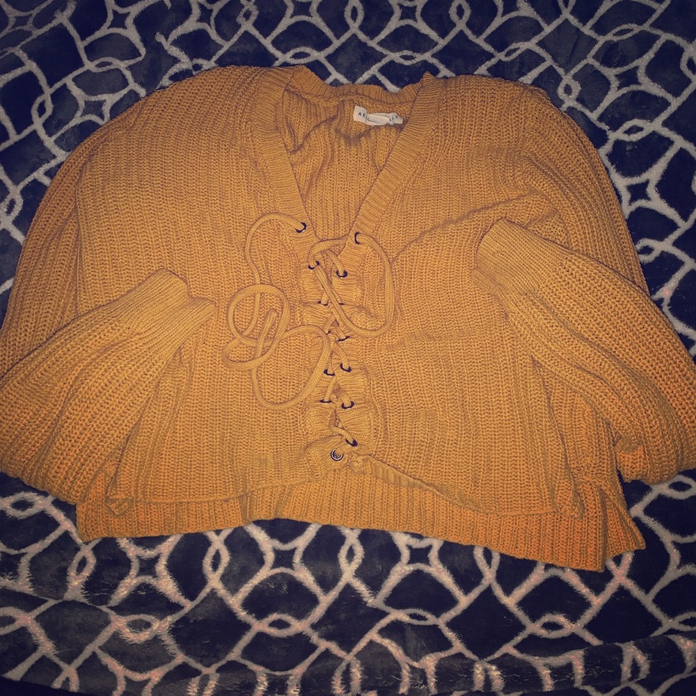 Tie sweater